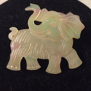 Hand carved mother of pearl elephant brooch